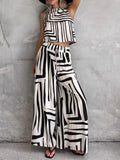 Sleeveless geometric print top and wide-leg pants set, striped black-and-white.