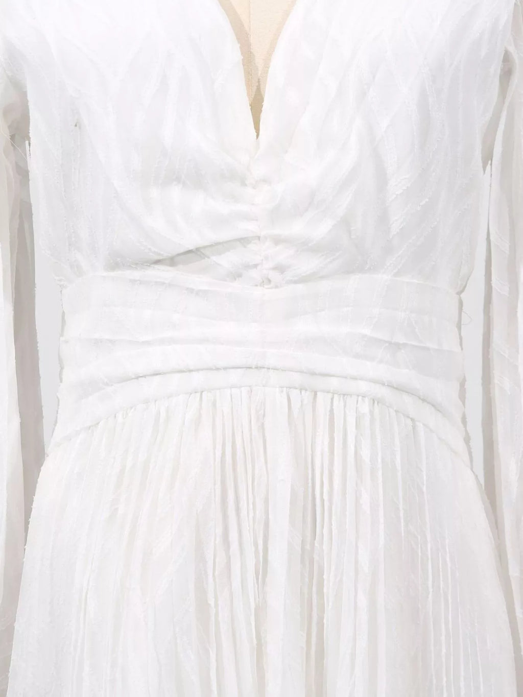 White ruched v-neck bodice with elastic waist gathers and sheer textured fabric