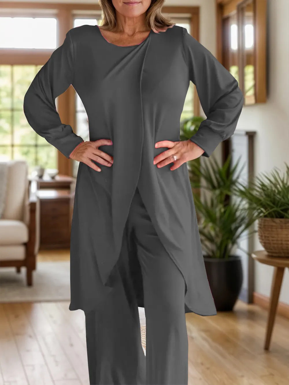 Two-piece slit top and pants set, charcoal gray, long sleeves, round neck, front view.