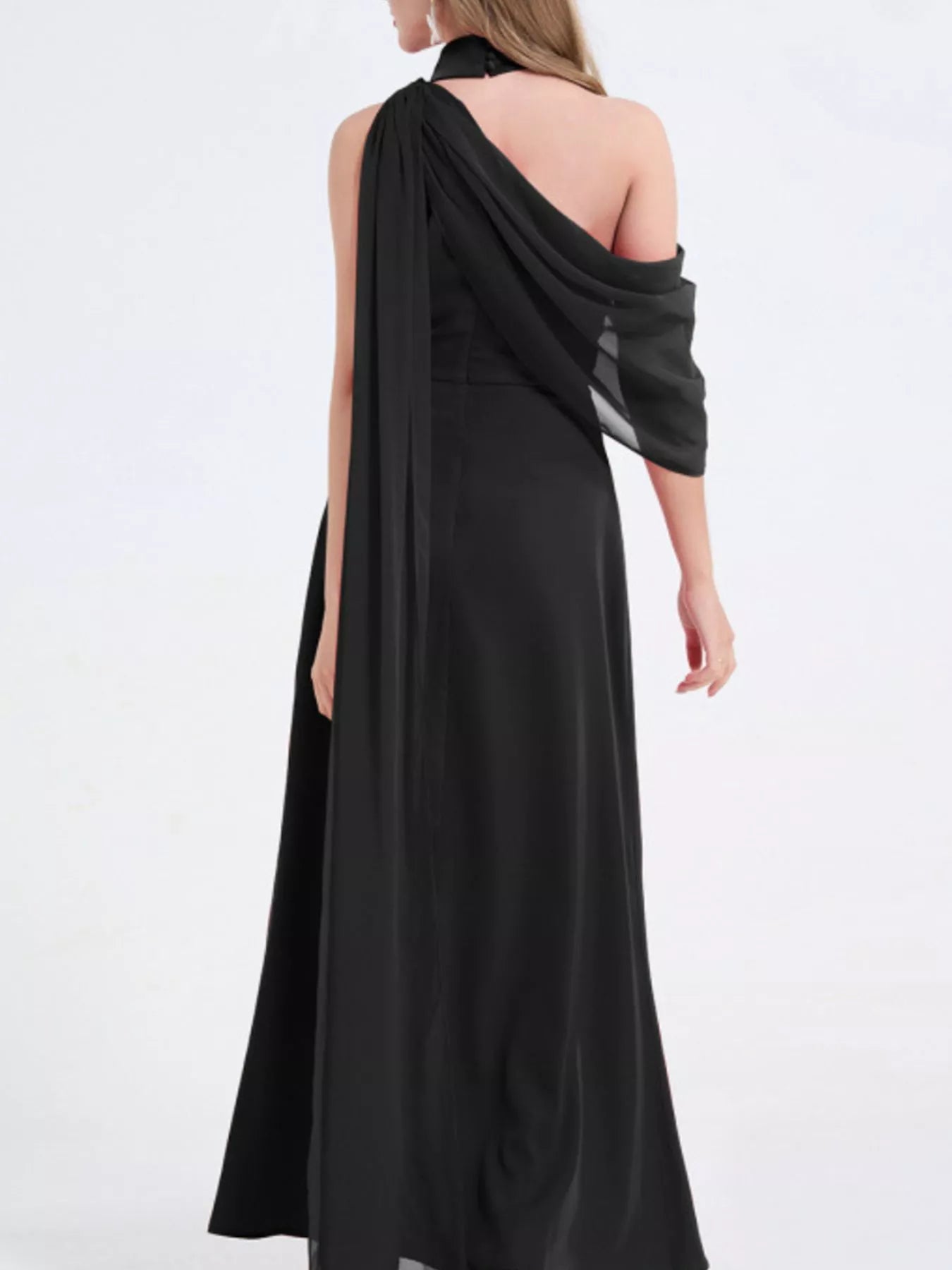 Black backless maxi dress with one-shoulder drape and high slit skirt
