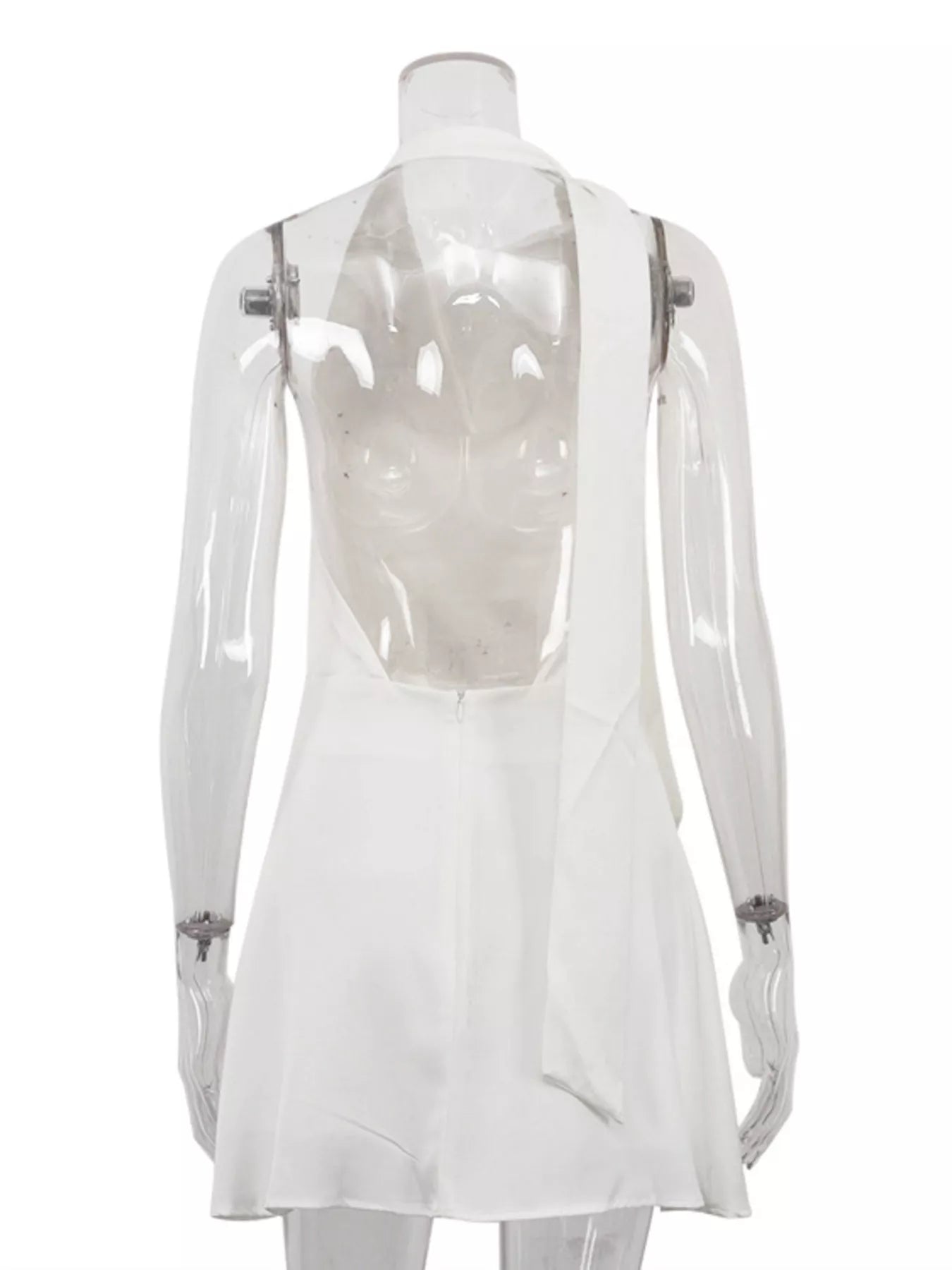White halter neck mini dress back view with open back and short flared silhouette
