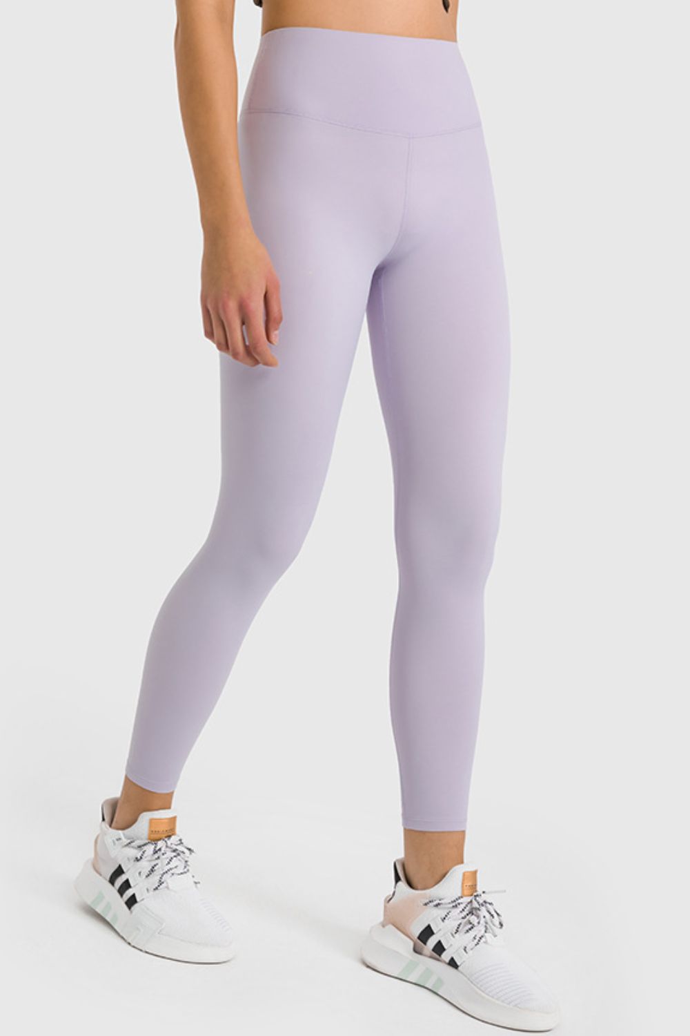 High-waist ankle-length yoga leggings in light lilac purple, full back view
