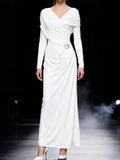 White ruched draped long-sleeve maxi dress with V-neck and diagonal wrap detail.