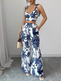 Blue and white floral crop top and wide-leg pants set, sleeveless with tied waist