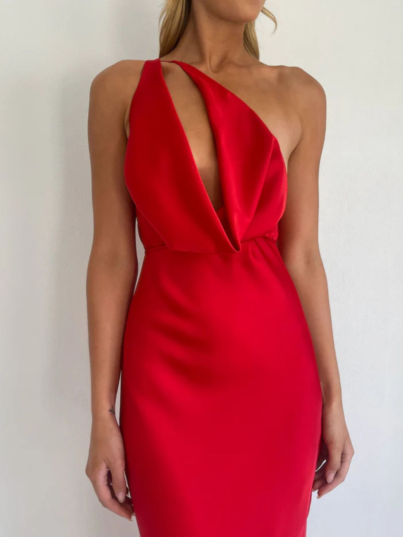 Red satin halter maxi dress with diagonal halter straps and draped front