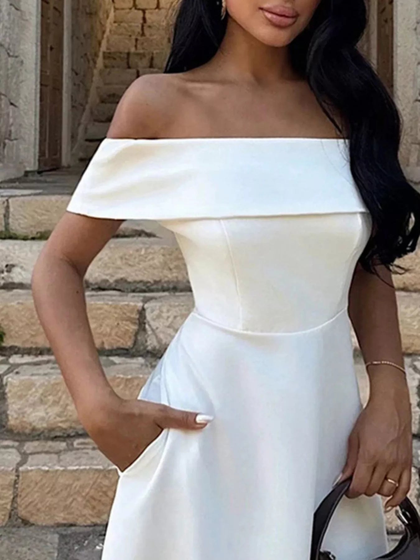 Off-shoulder A-line maxi dress in off-white, off-the-shoulder neckline and defined waist