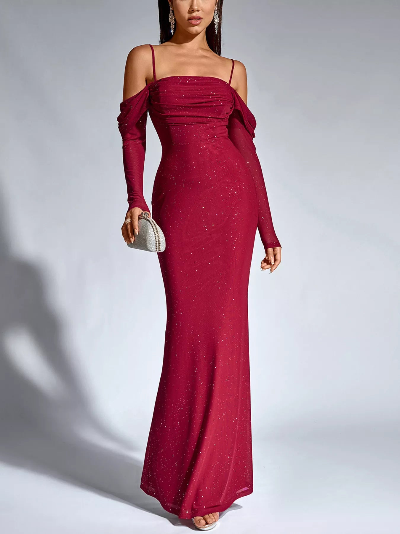Wine red glitter mermaid maxi dress with off-shoulder neckline, ruched detailing, and long sleeves