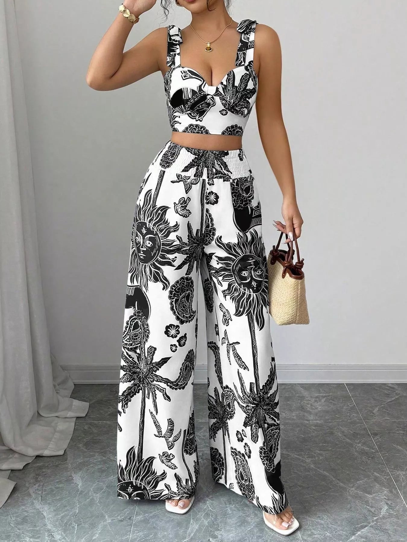 Black-and-white floral print V-neck crop top and wide-leg pants set with high waist