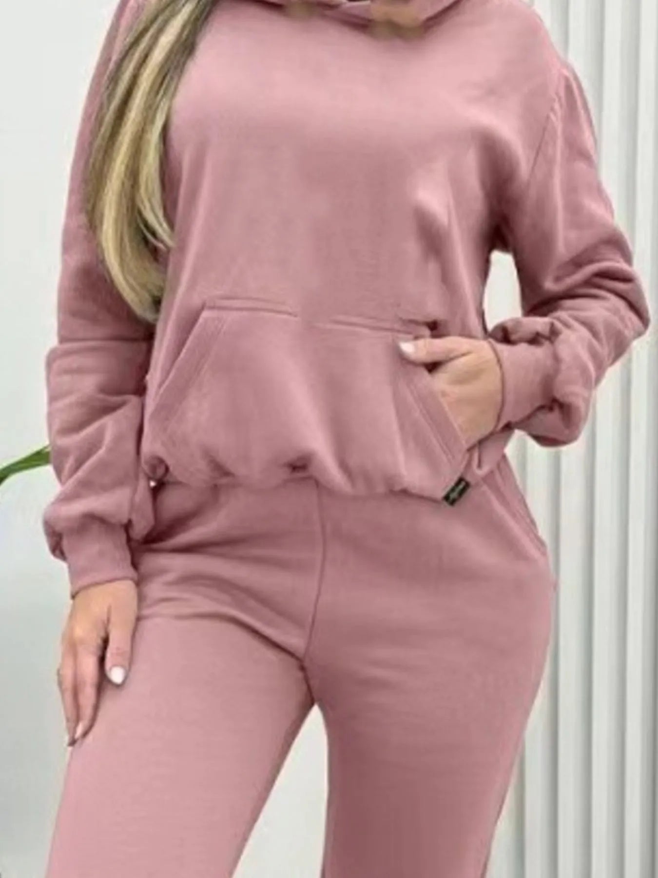 Pink long-sleeve hoodie and joggers set with kangaroo pocket and drawstring waist