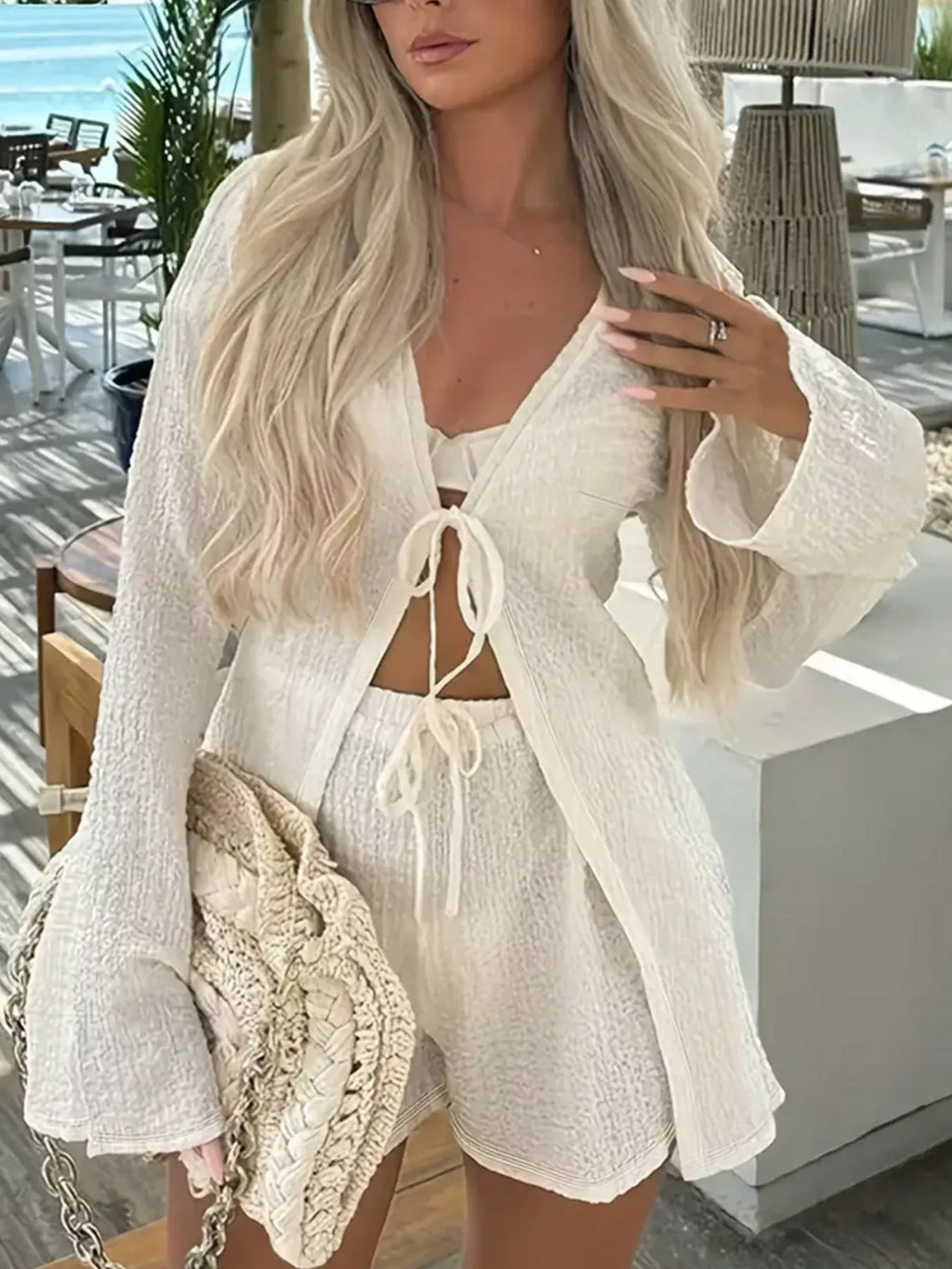 White textured tie-front cover-up and shorts set with lace-up V neckline and drawstring
