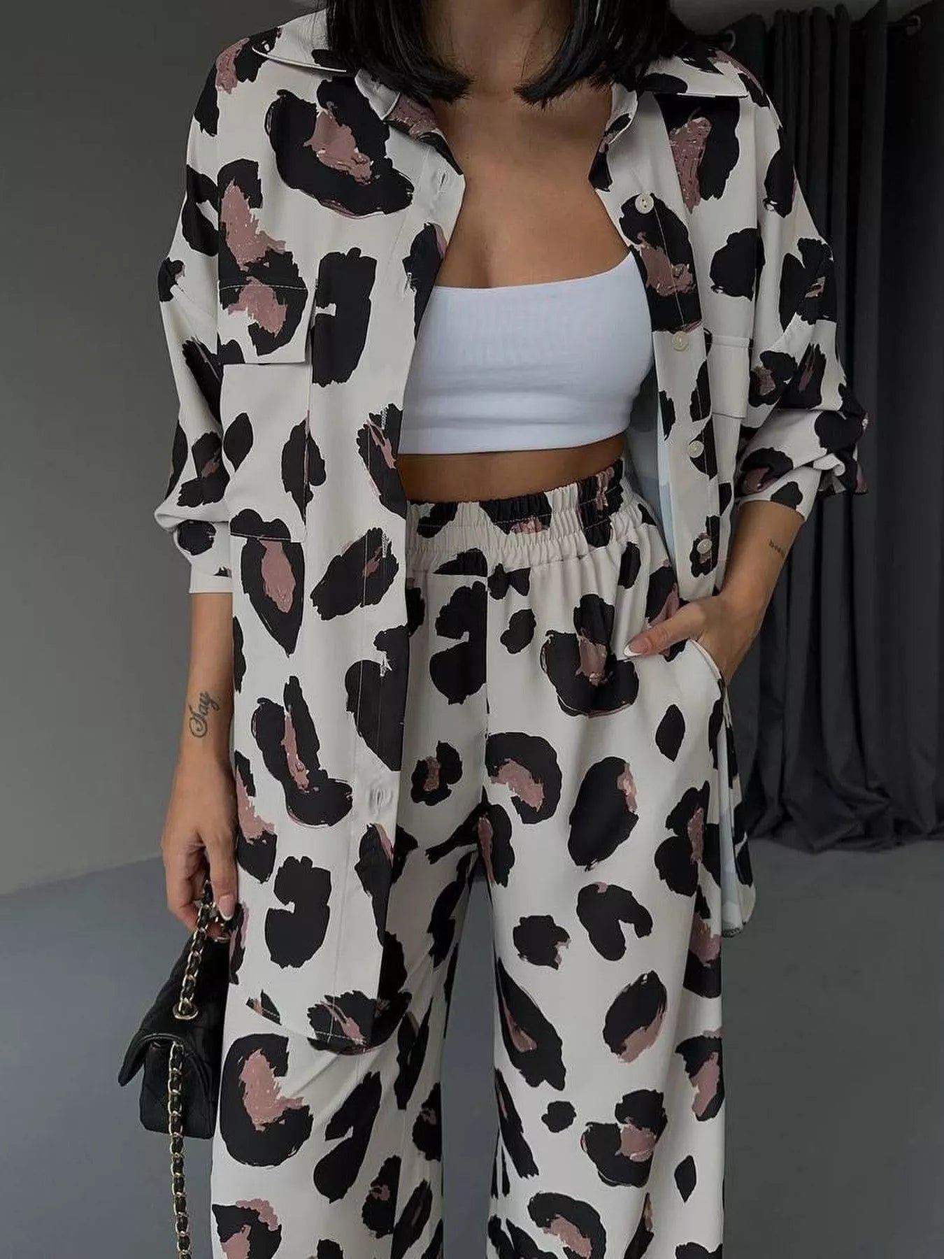 Leopard print long open shirt and wide-leg pants set, front view