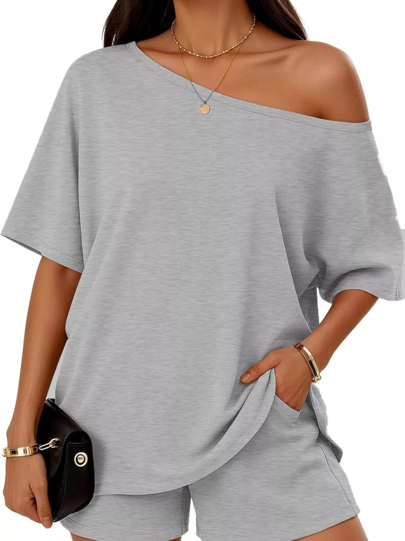 Plus size one-shoulder light gray top and shorts set with diagonal neckline and relaxed fit