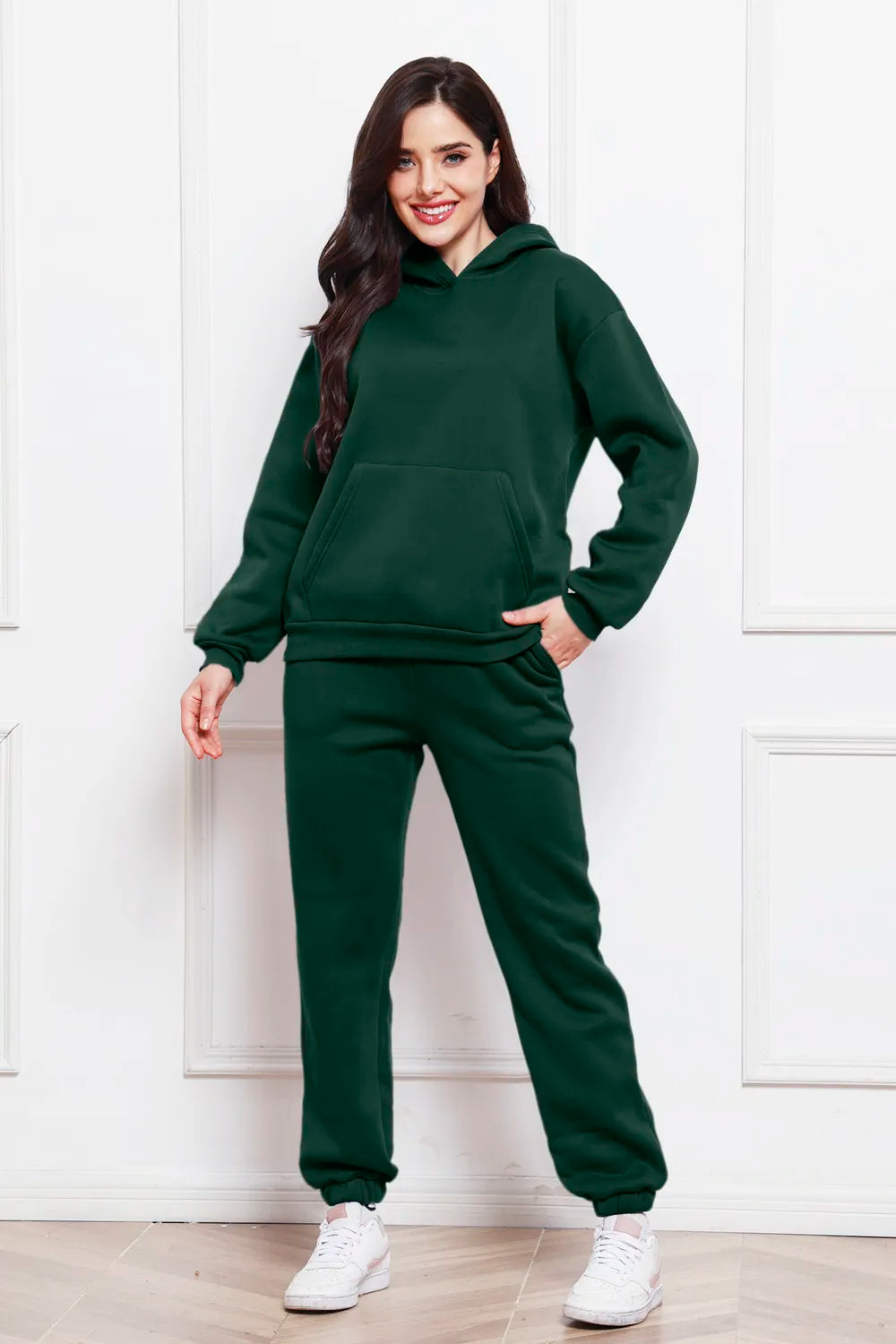 Dark green drop-shoulder long-sleeve hoodie and jogger pants set, front view
