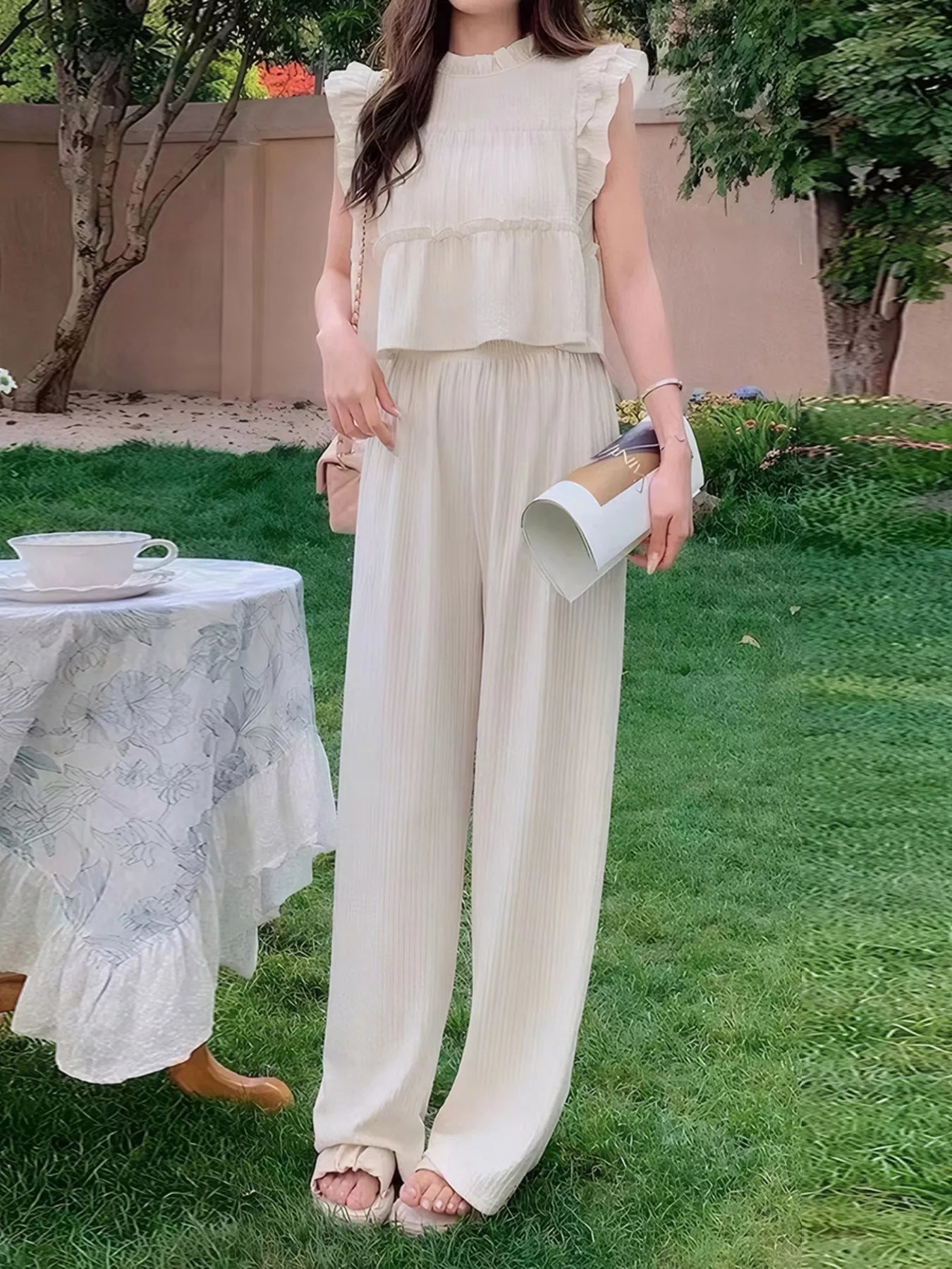Apricot sleeveless ruffled top and flowy wide-leg pants set, full-length