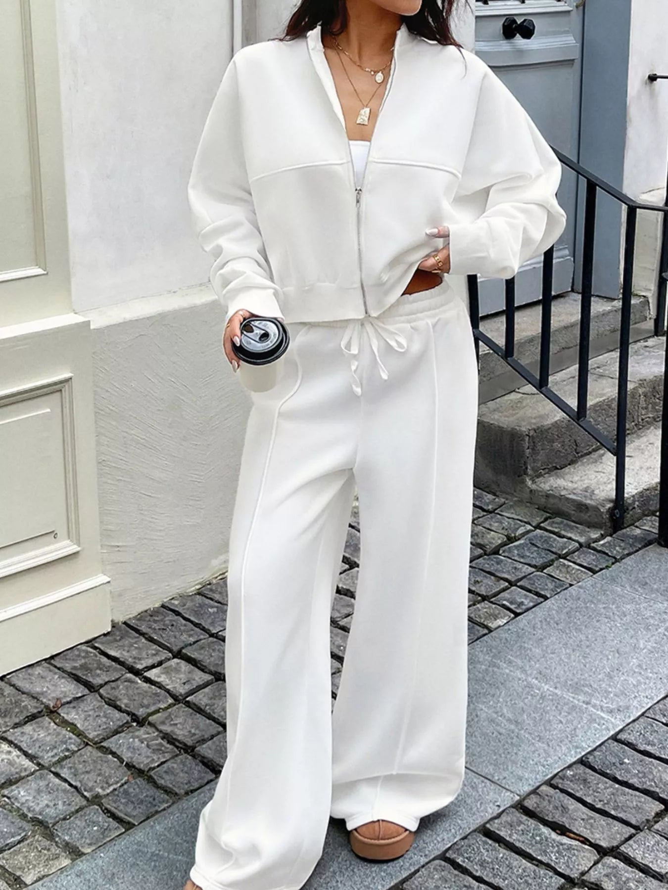 White zip-up jacket and wide-leg pants set with drawstring waist