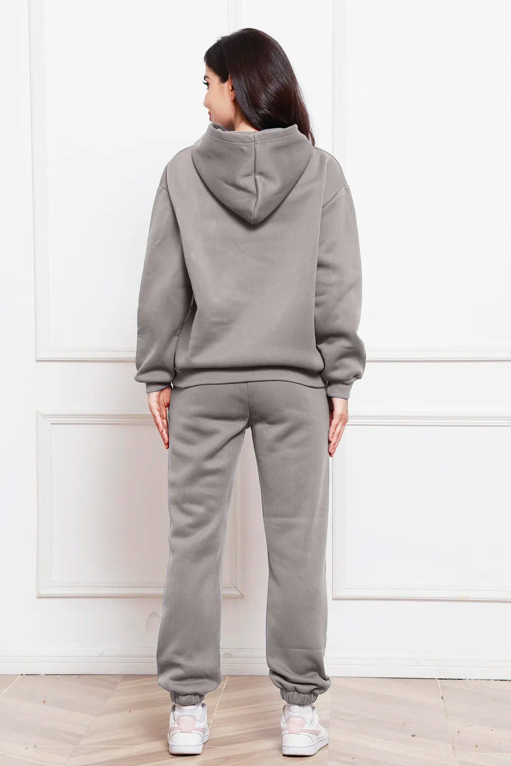 Gray back-view drop-shoulder pullover hoodie and jogger pants set with drawstring hood