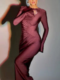 Ruched bodycon maxi dress in burgundy with long sleeves and side draped detailing