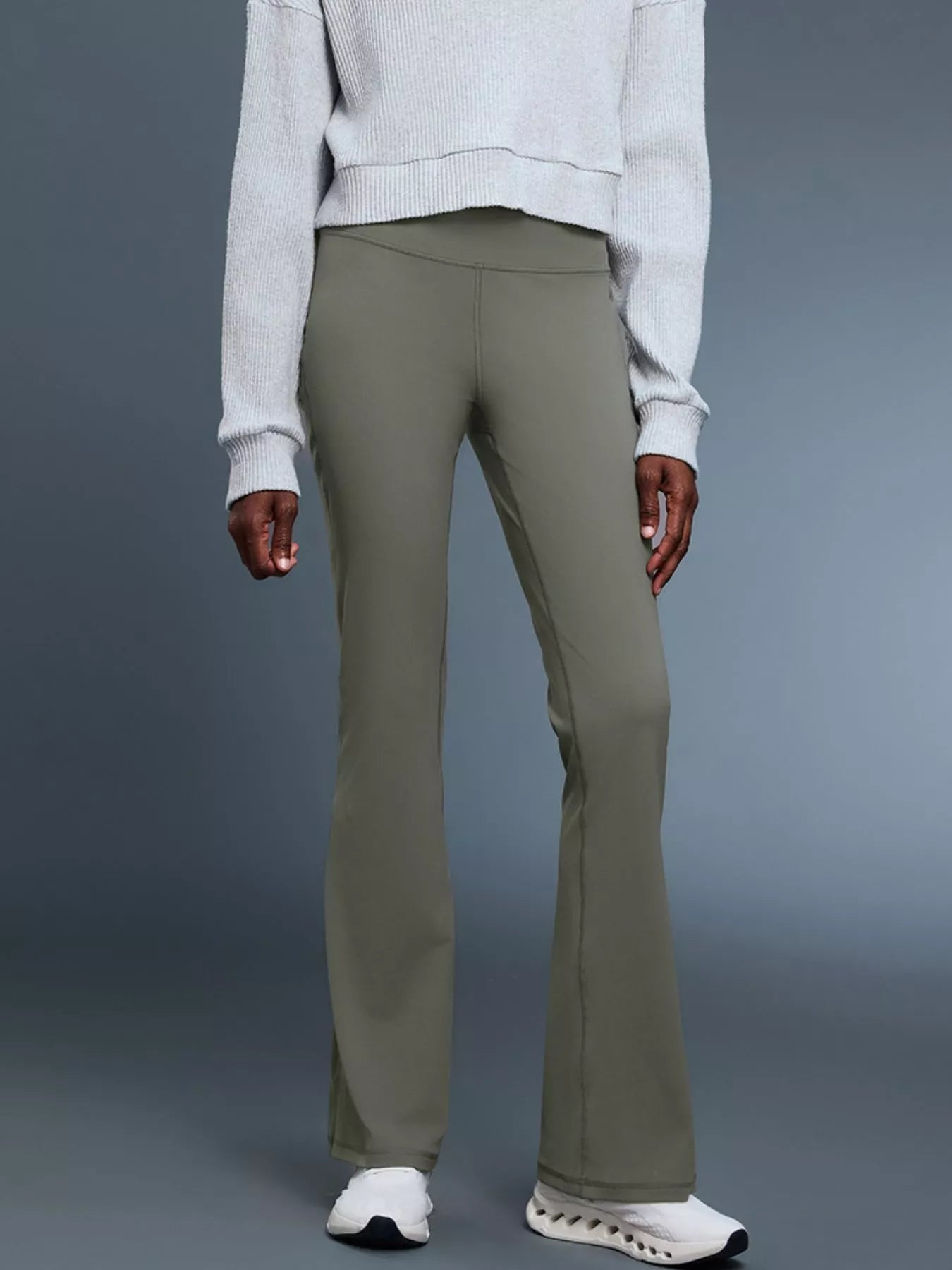 Sage green high-waisted flare active pants with straight wide legs