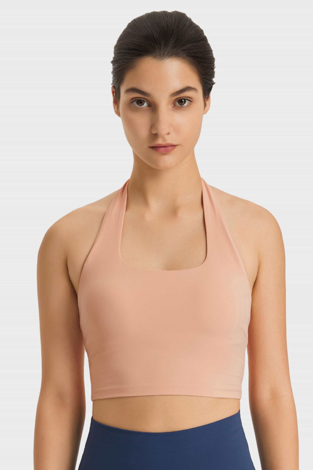 Breathable halter sports bra in nude, scoop halter neckline with cropped underbust band
