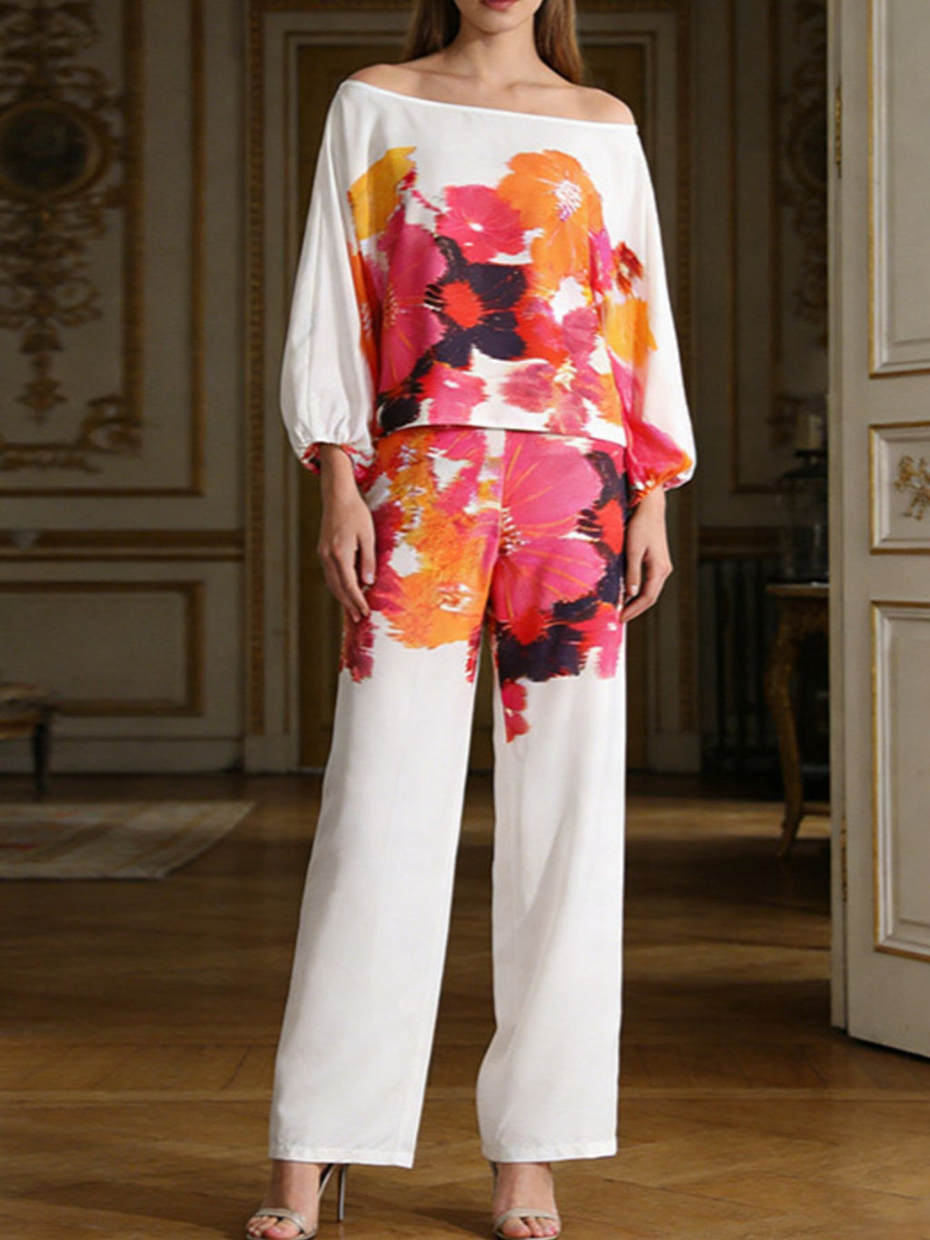 Off-shoulder floral top and white wide-leg pants set with multicolor print