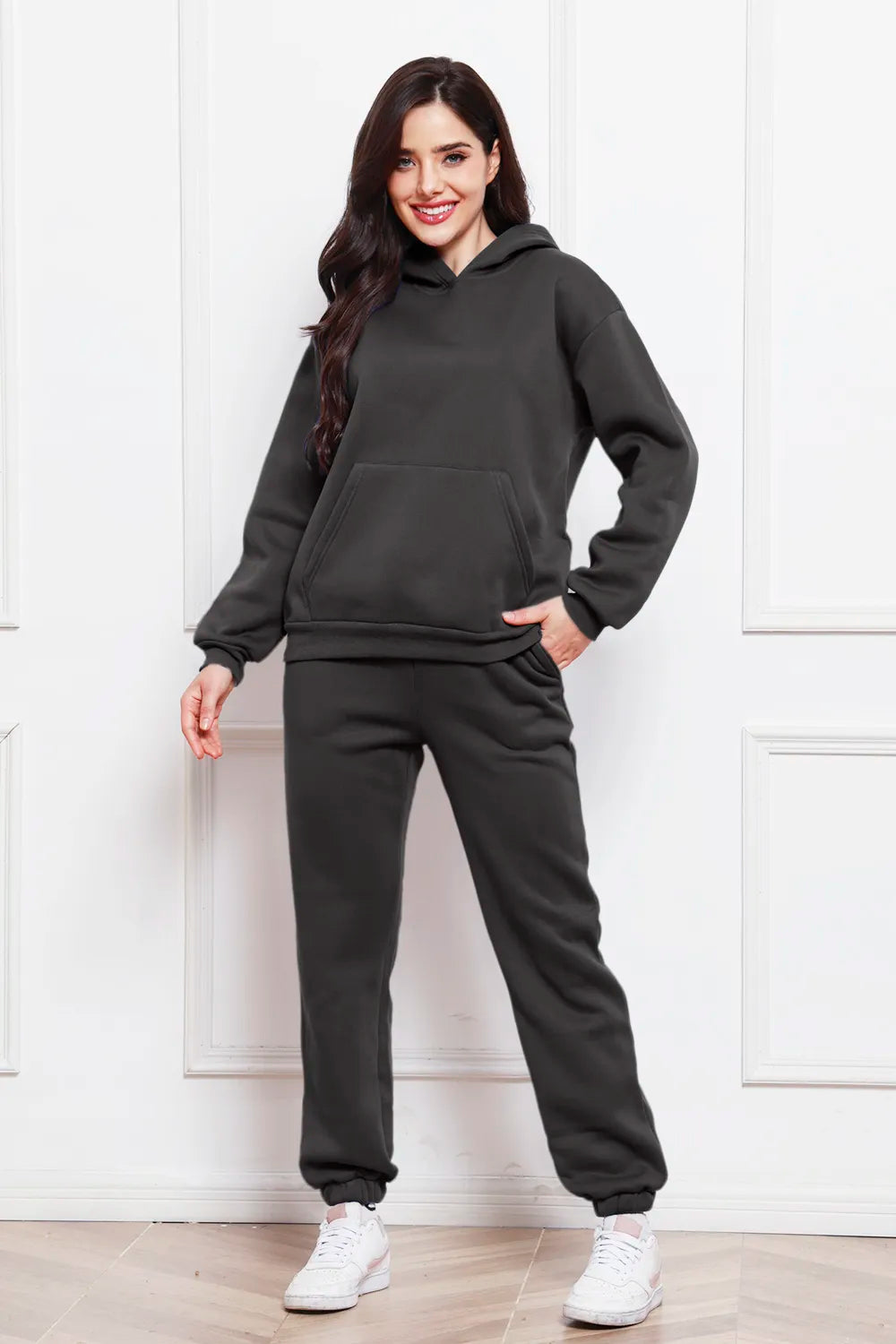 Black drop-shoulder pullover hoodie and jogger pants set with drawstring hood and front pocket
