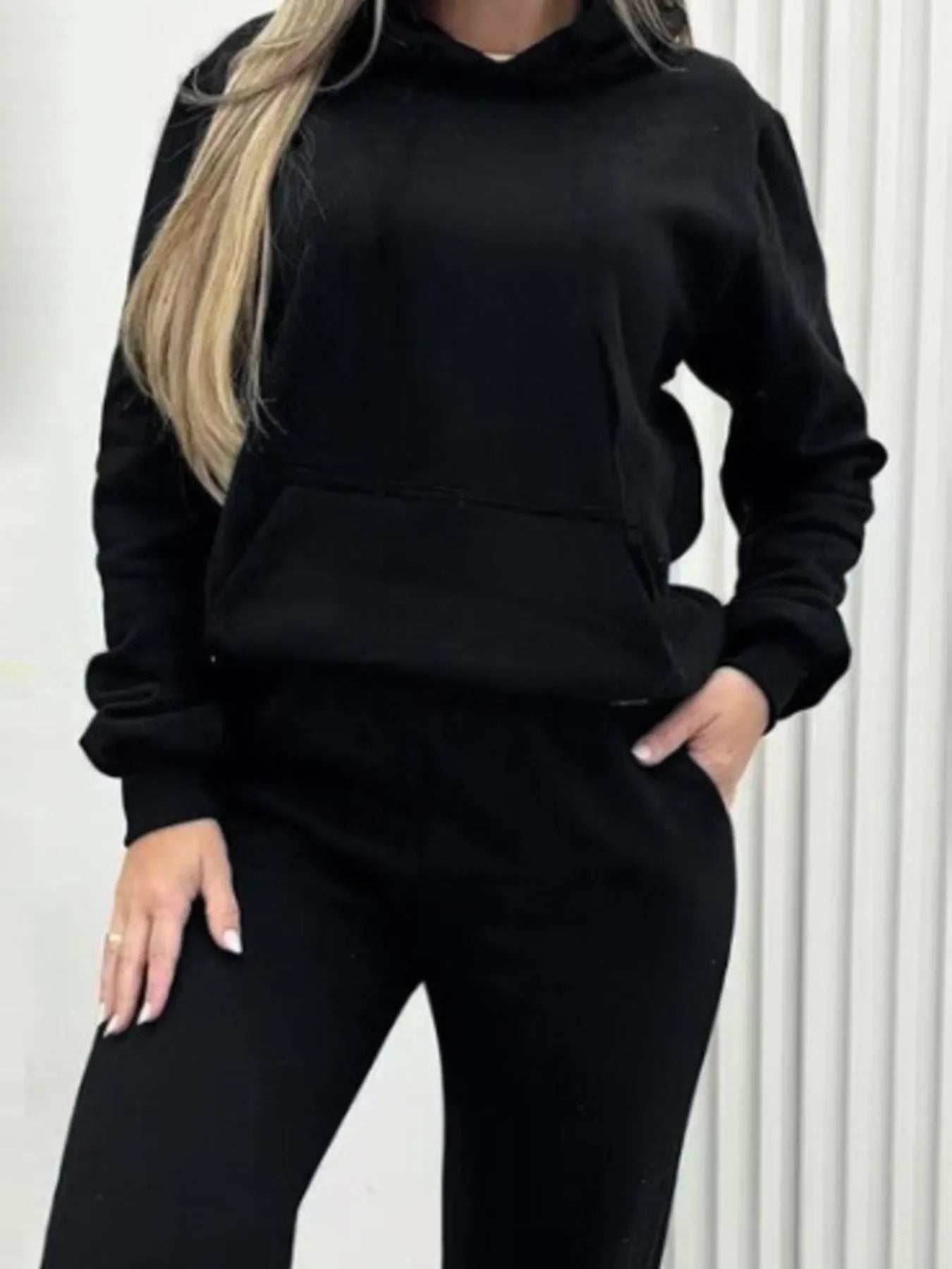 Black long-sleeve hoodie and joggers set with kangaroo pocket and drawstring waist