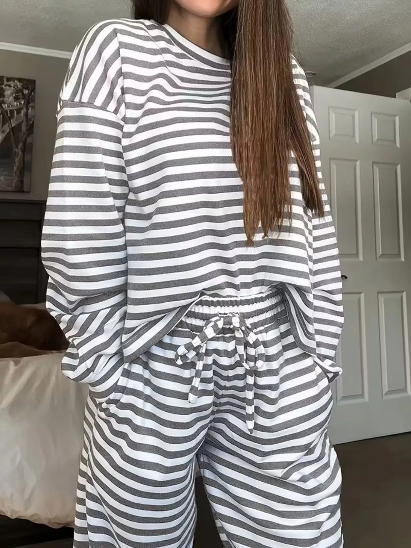 Striped round-neck top and drawstring waist pants set in black and white