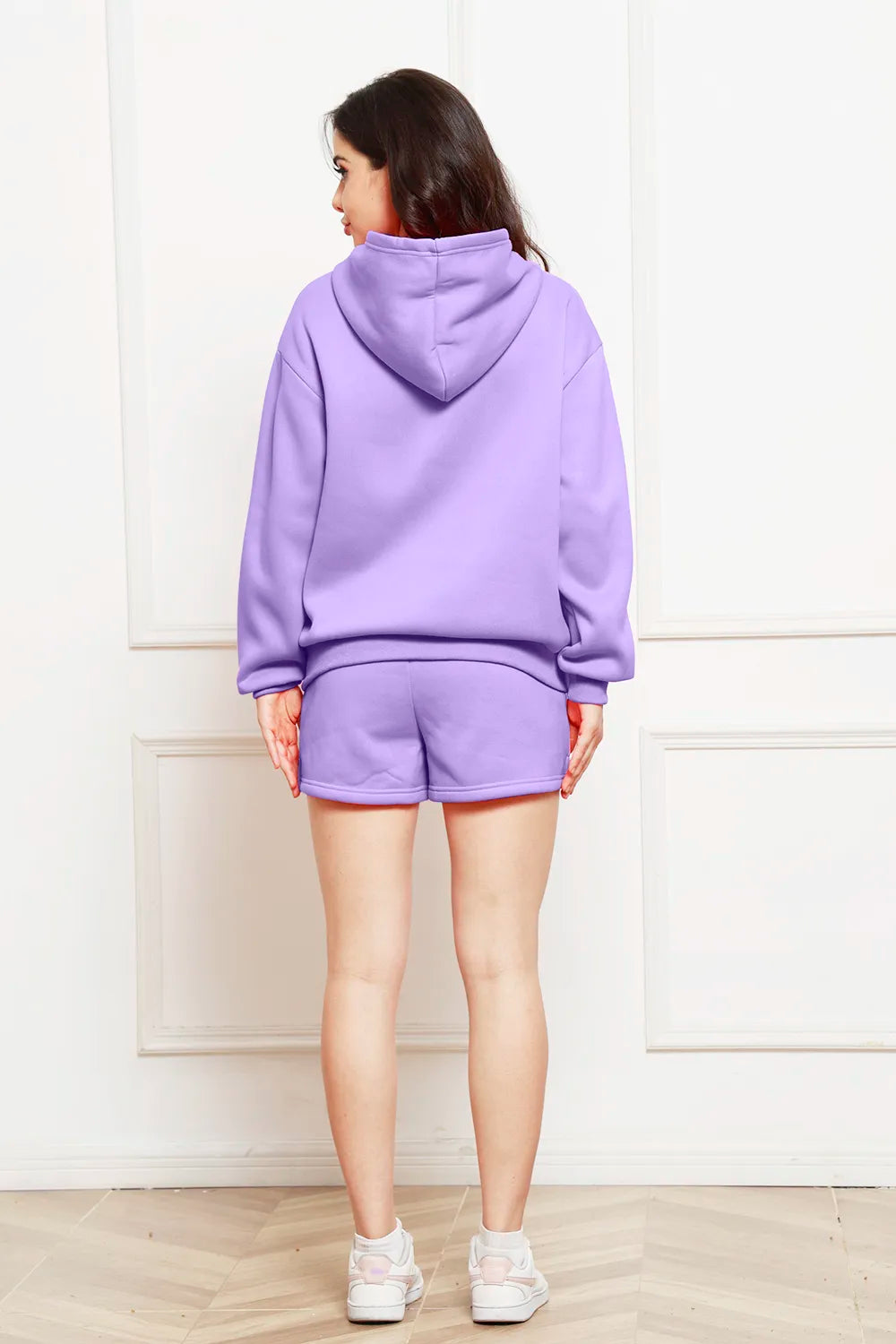 Back view lavender drop-shoulder long sleeve hoodie and matching shorts set