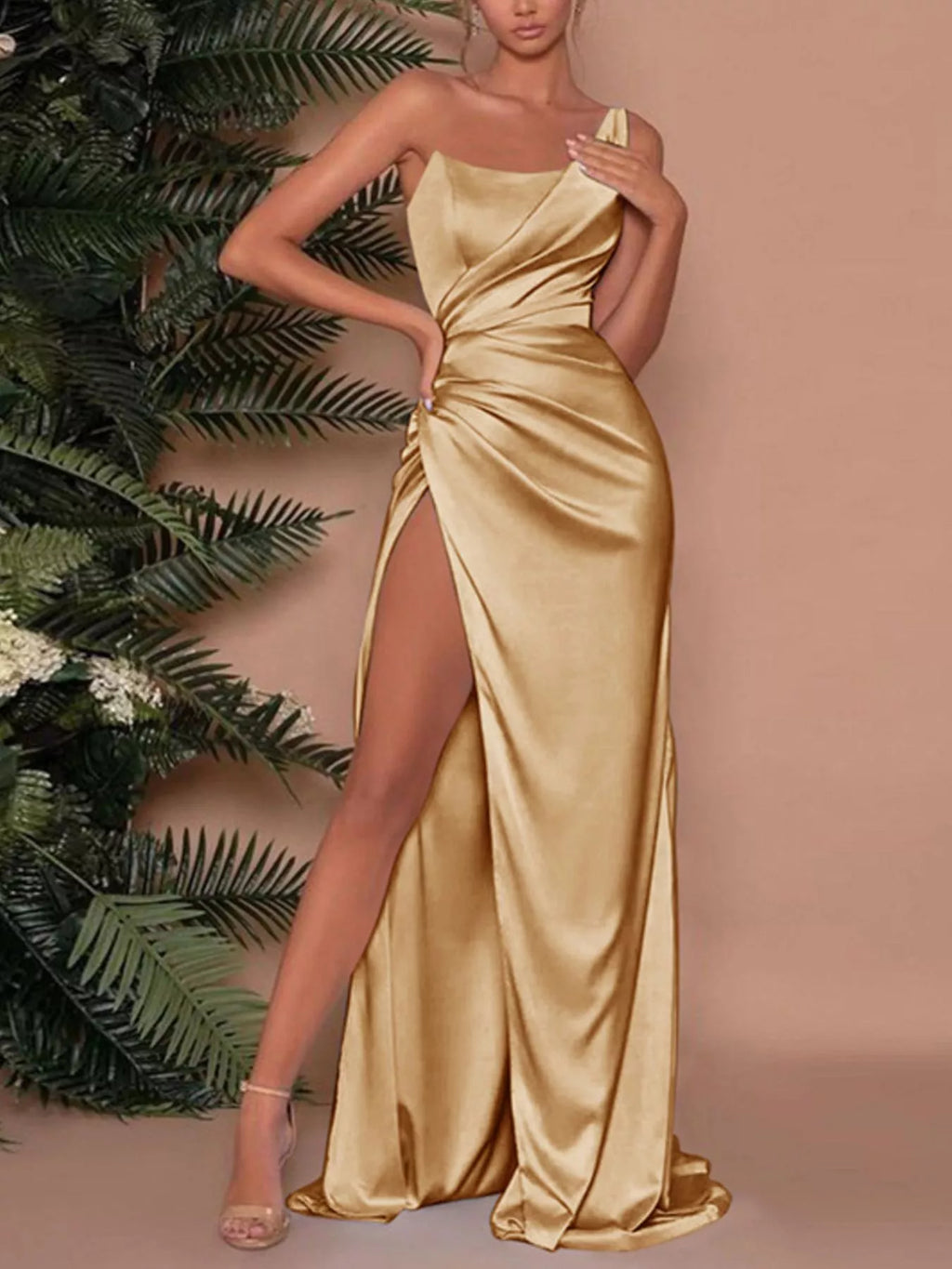 Gold one-shoulder satin maxi dress with draped bodice and high side slit