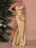 Gold one-shoulder satin maxi dress with draped bodice and high side slit