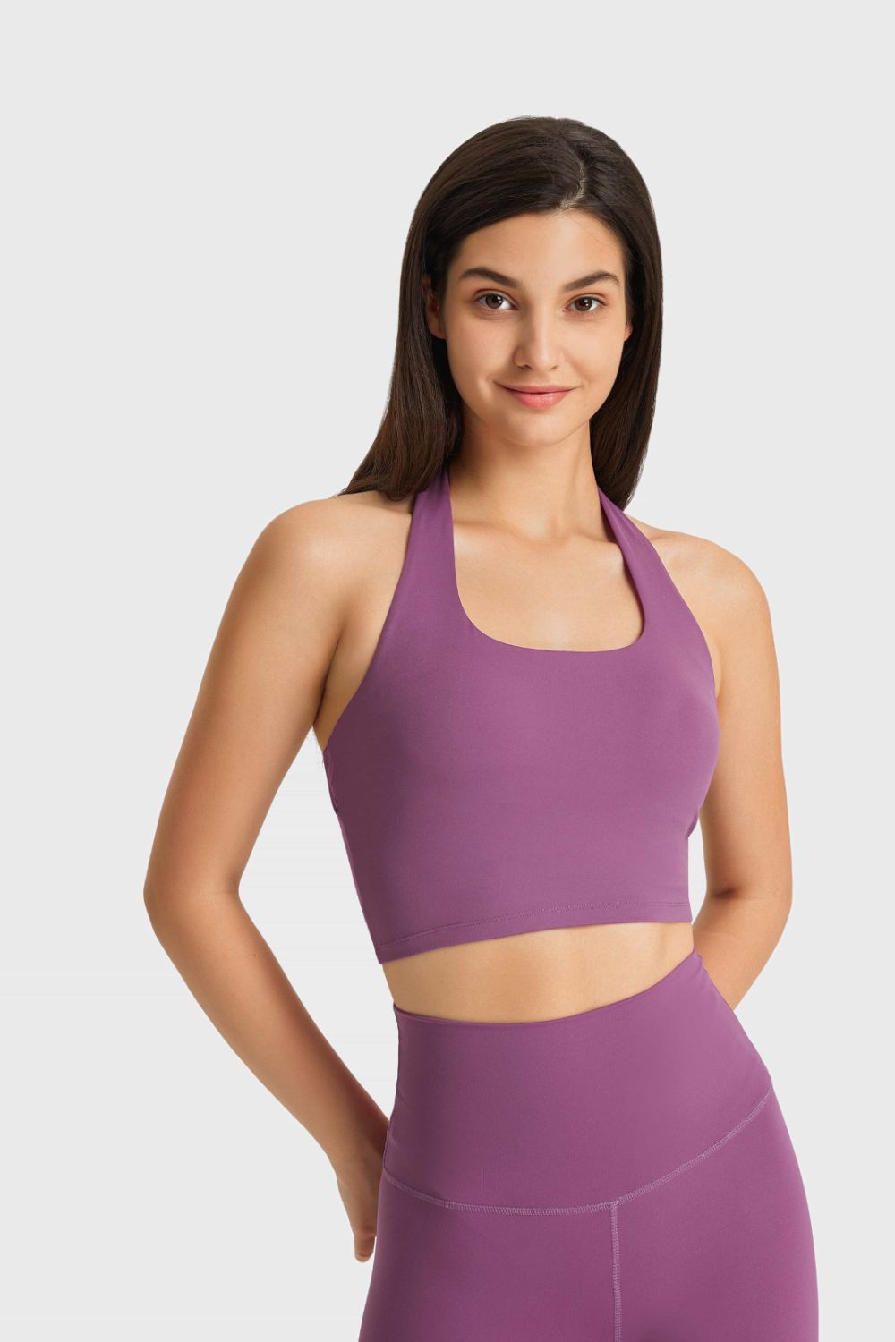 Breathable halter sports bra in purple, scoop neckline with racerback-style support