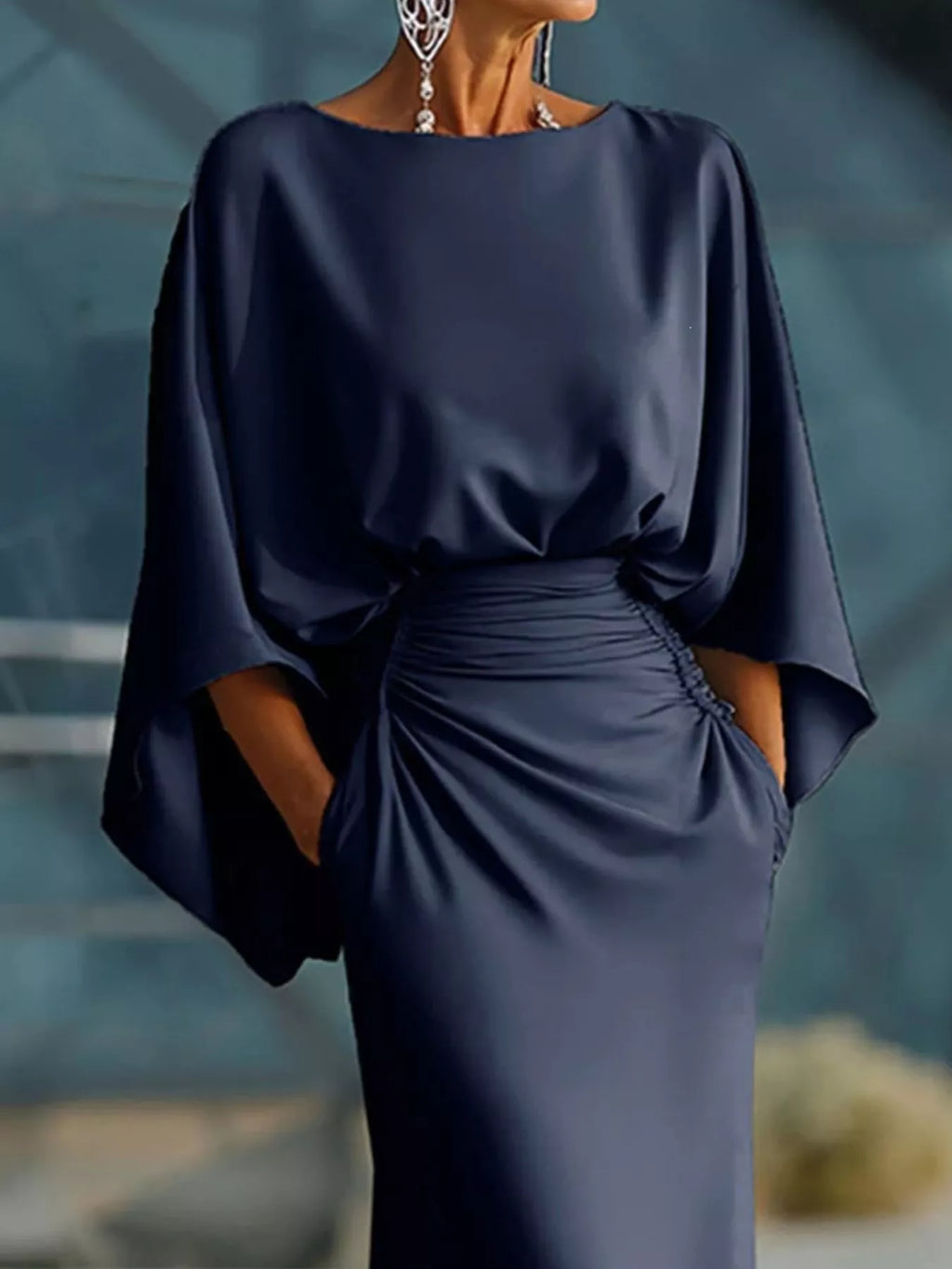 Navy satin maxi dress with batwing sleeves and open V-back, gathered waist