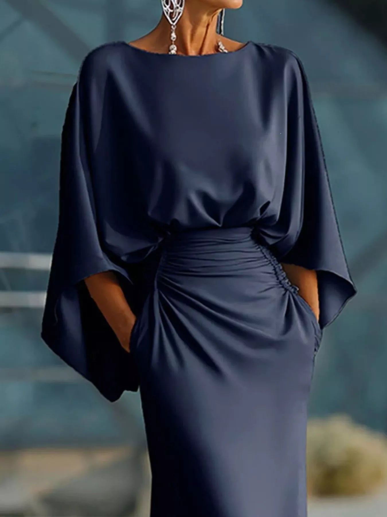 Navy satin maxi dress with batwing sleeves and open V-back, gathered waist