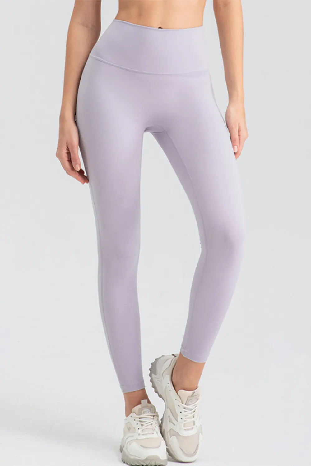 High-waist skinny active pants in light lavender, ankle length, solid color