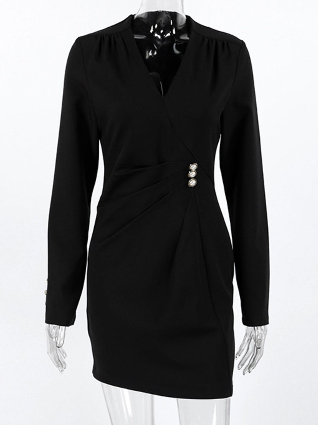 Black long-sleeve surplice dress on a mannequin with pearl button accent at the waist.