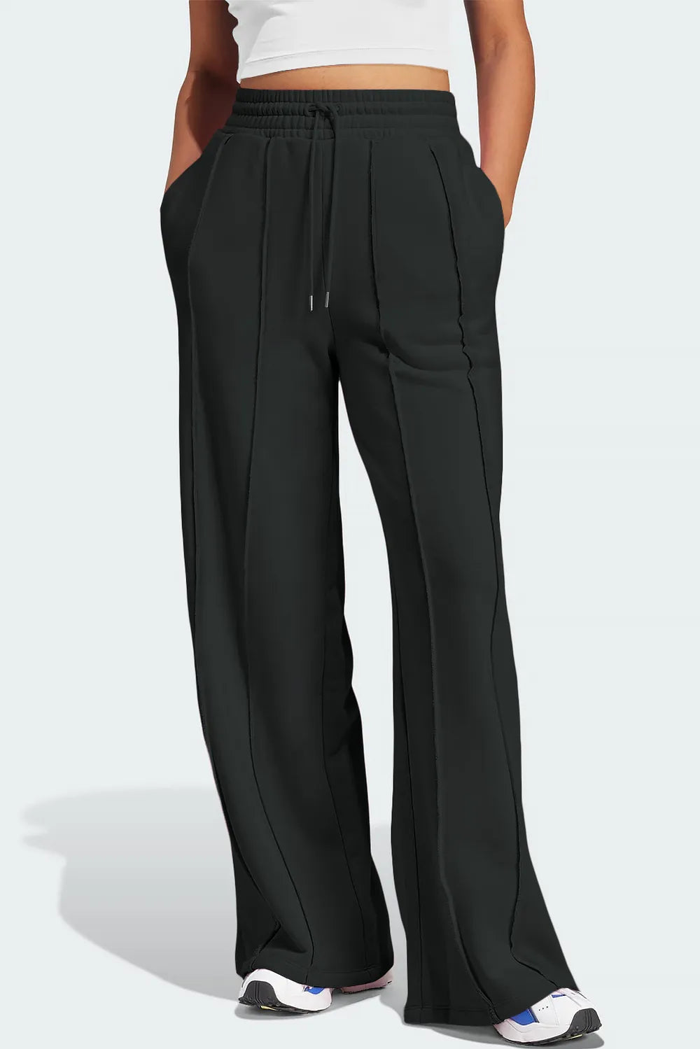 Women’s black wide-leg active pants with drawstring elastic waist and flowing legs