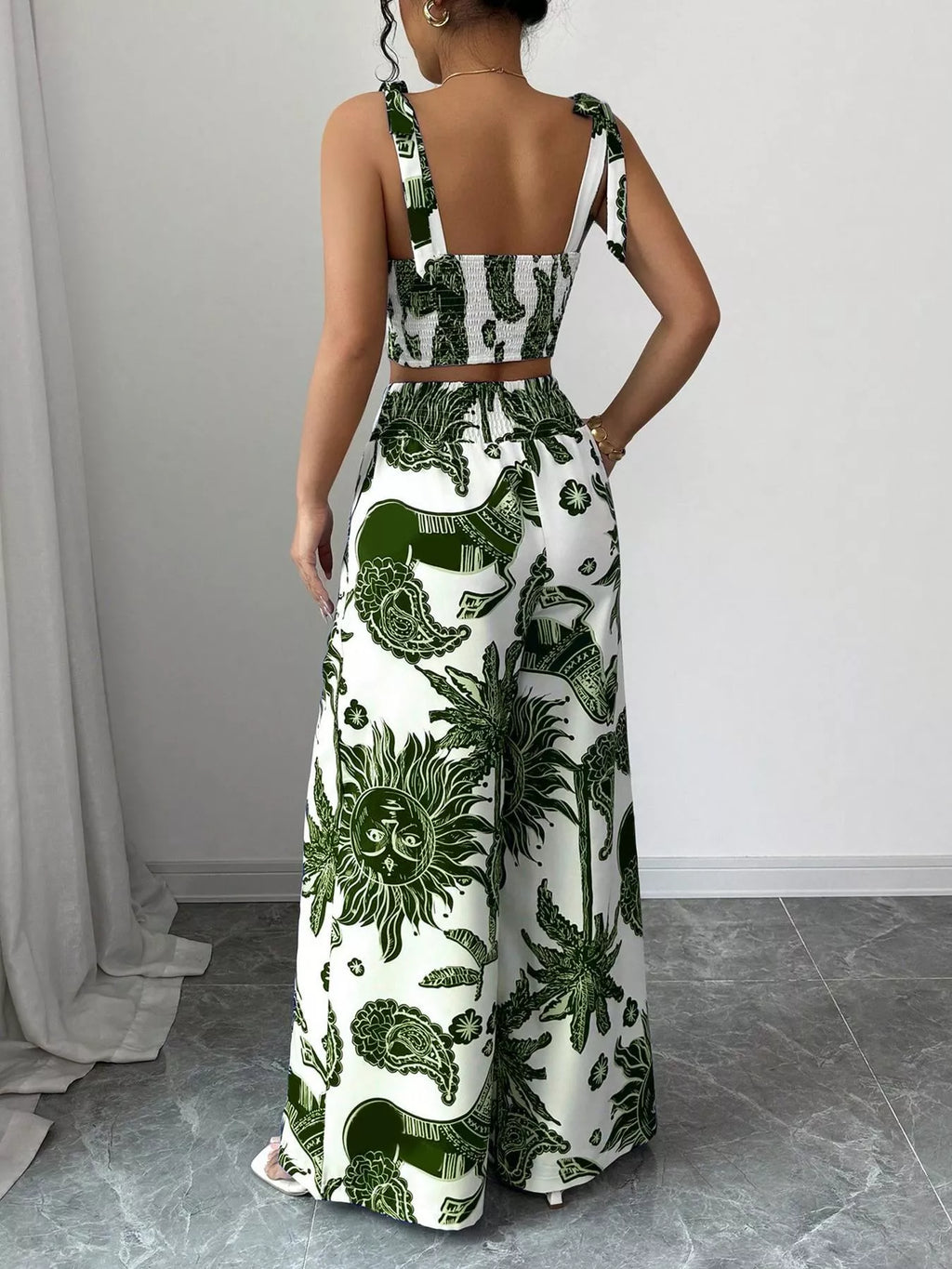Green and white floral sleeveless crop top and wide-leg pants set, back view