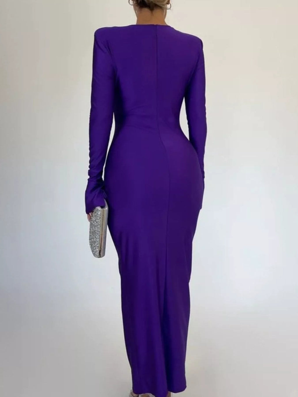 Purple ruched bodycon maxi dress, back view with long sleeves and diagonal seams