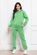 Hoodie and pants set in neon green with kangaroo pocket and drawstring hood