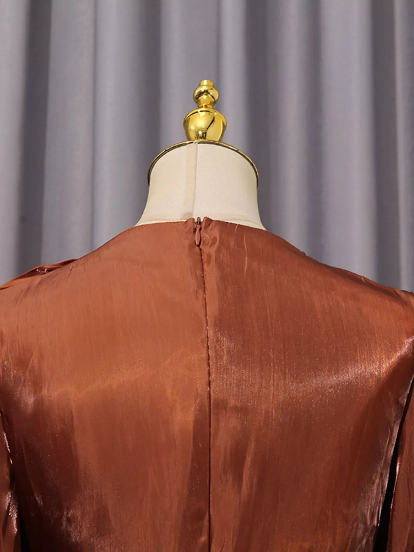 Rust satin maxi dress with twisted drape back and long sleeves