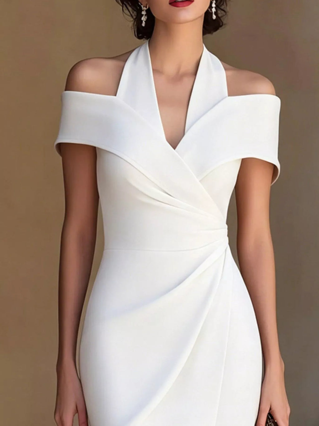 White cold-shoulder halter midi dress with V-neck wrap detail and draped waist panel
