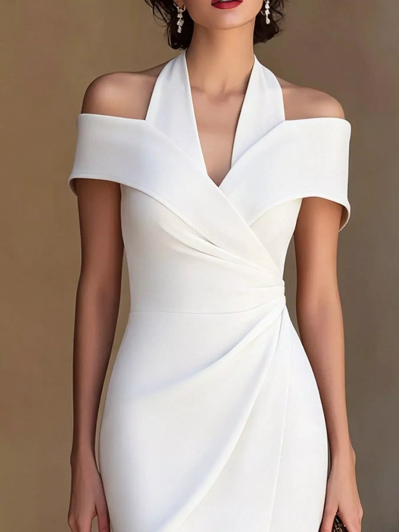White cold-shoulder halter midi dress with V-neck wrap detail and draped waist panel