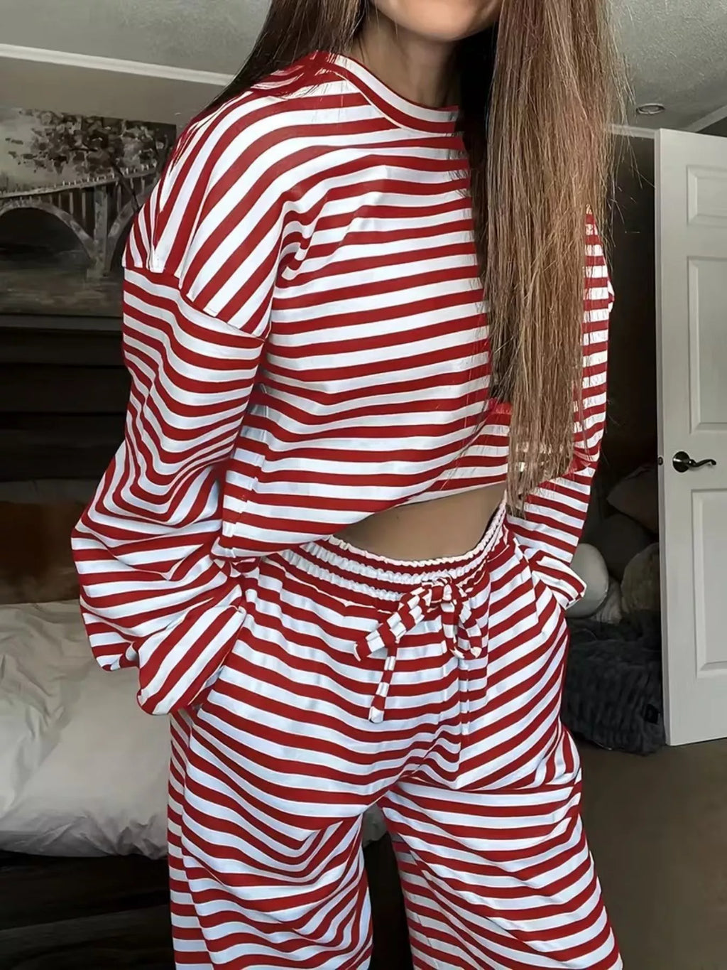 Scarlet-and-white striped lounge set with long sleeves, crew neck, and wide-leg pants
