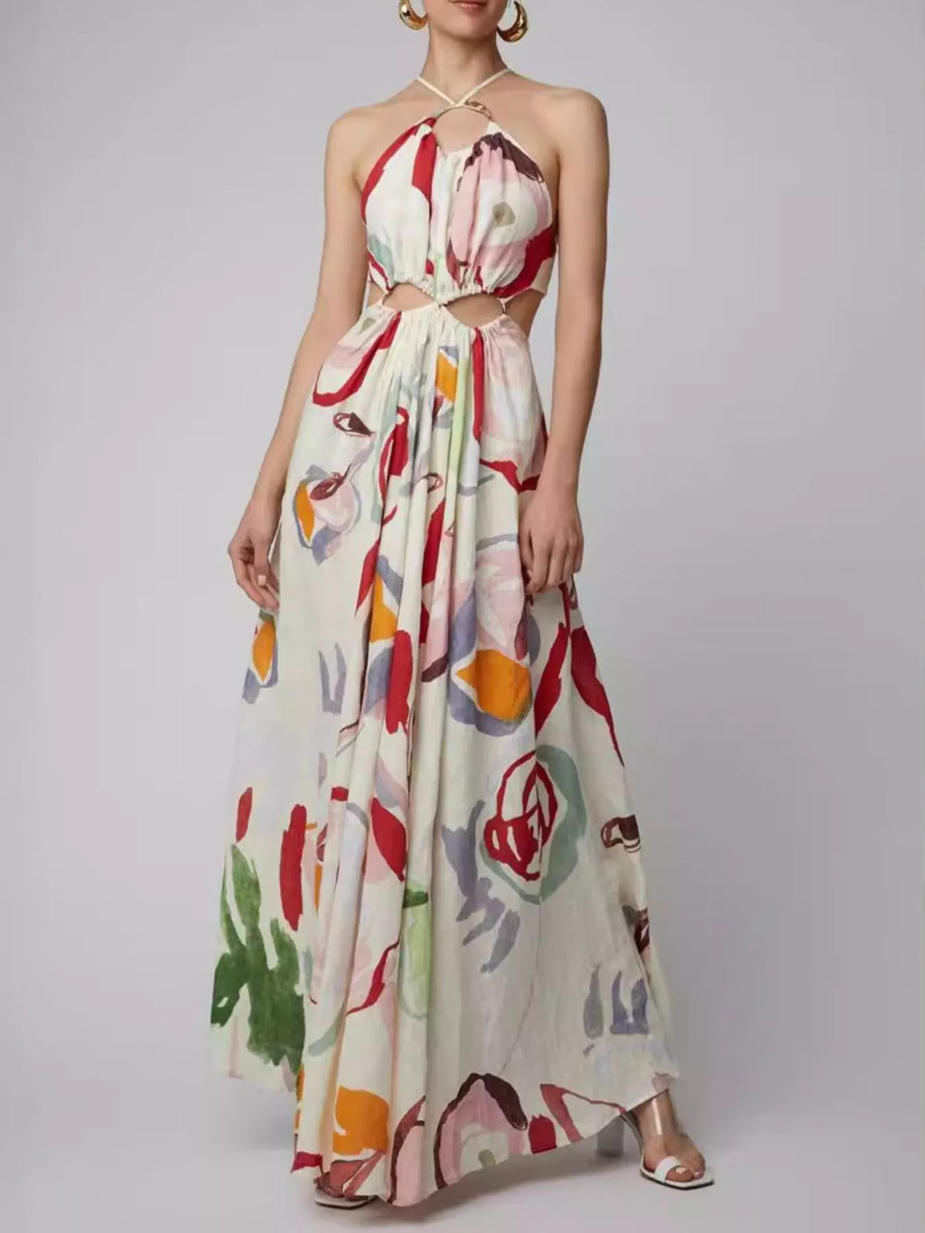 Printed halter-neck cut-out maxi dress in white with colorful abstract print, sleeveless