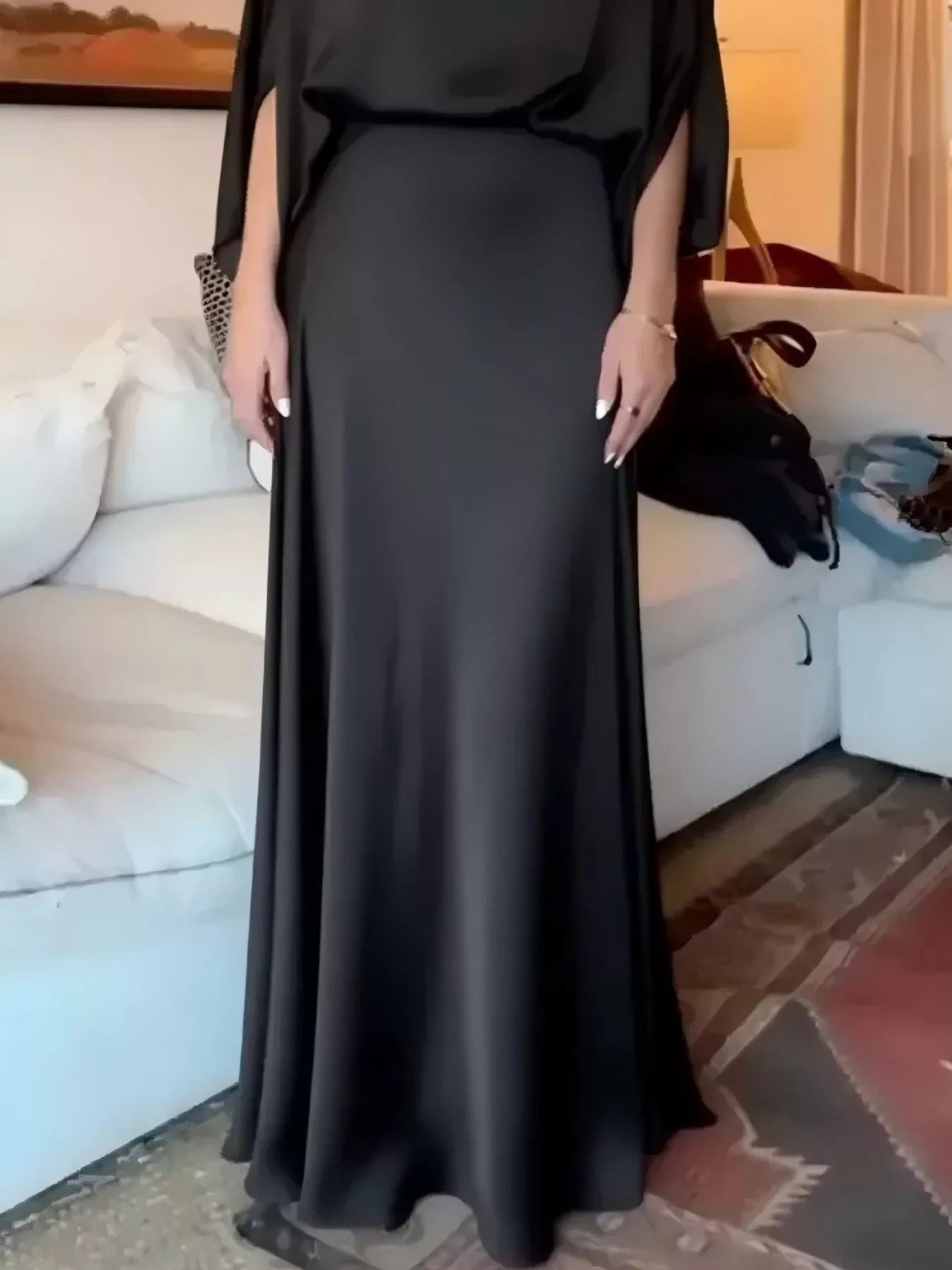 Black satin maxi dress with batwing sleeves and draped bodice front detail