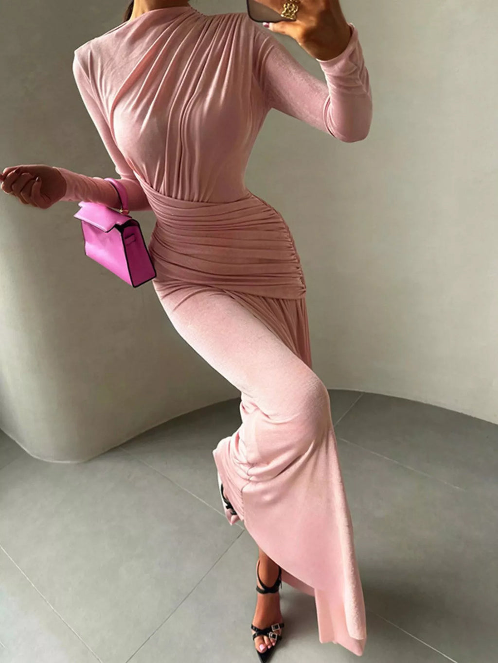 Pink long-sleeve maxi dress with ruched bodice, high neck, and side gathered detail