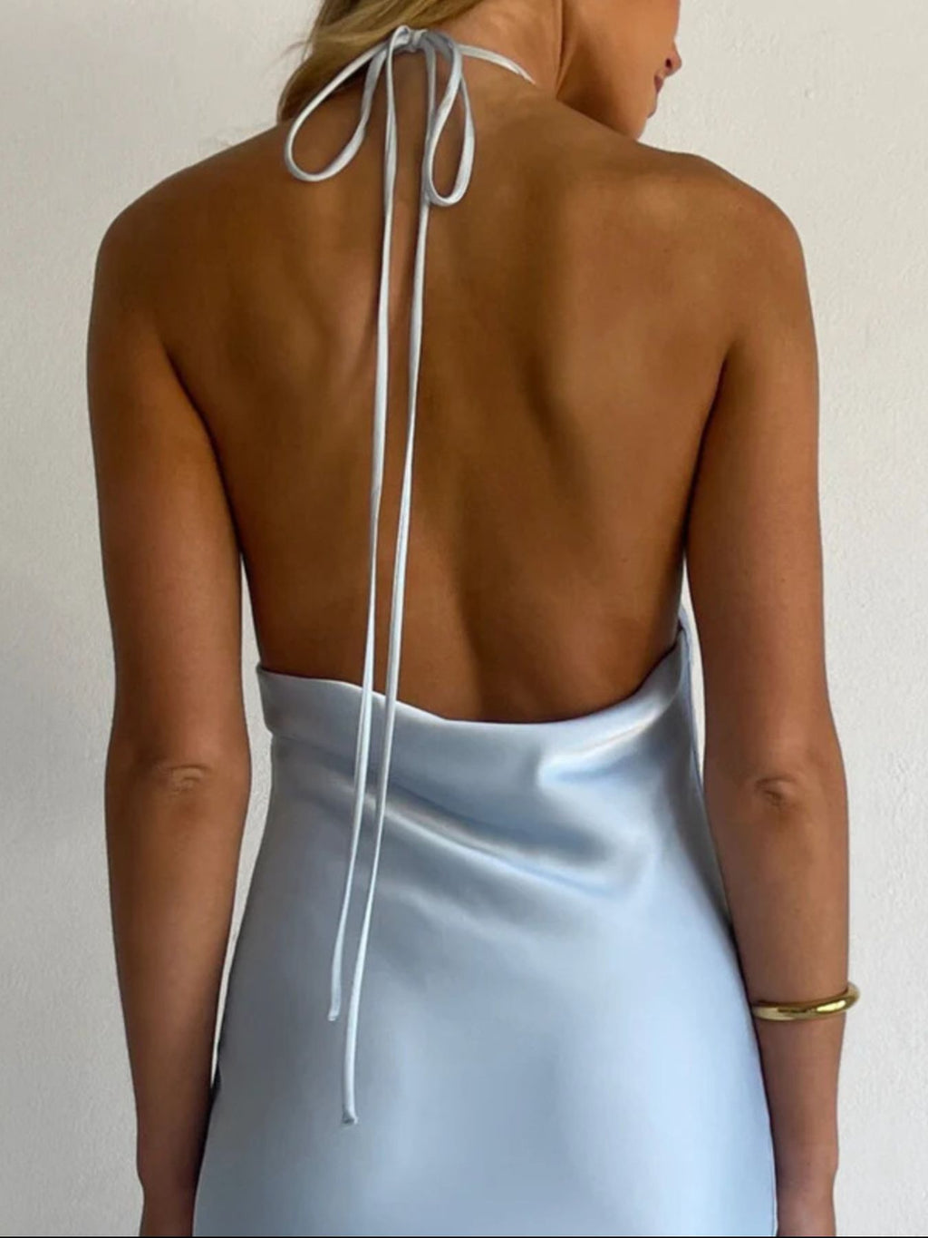 Light blue satin halter maxi dress with open back and thin tie straps