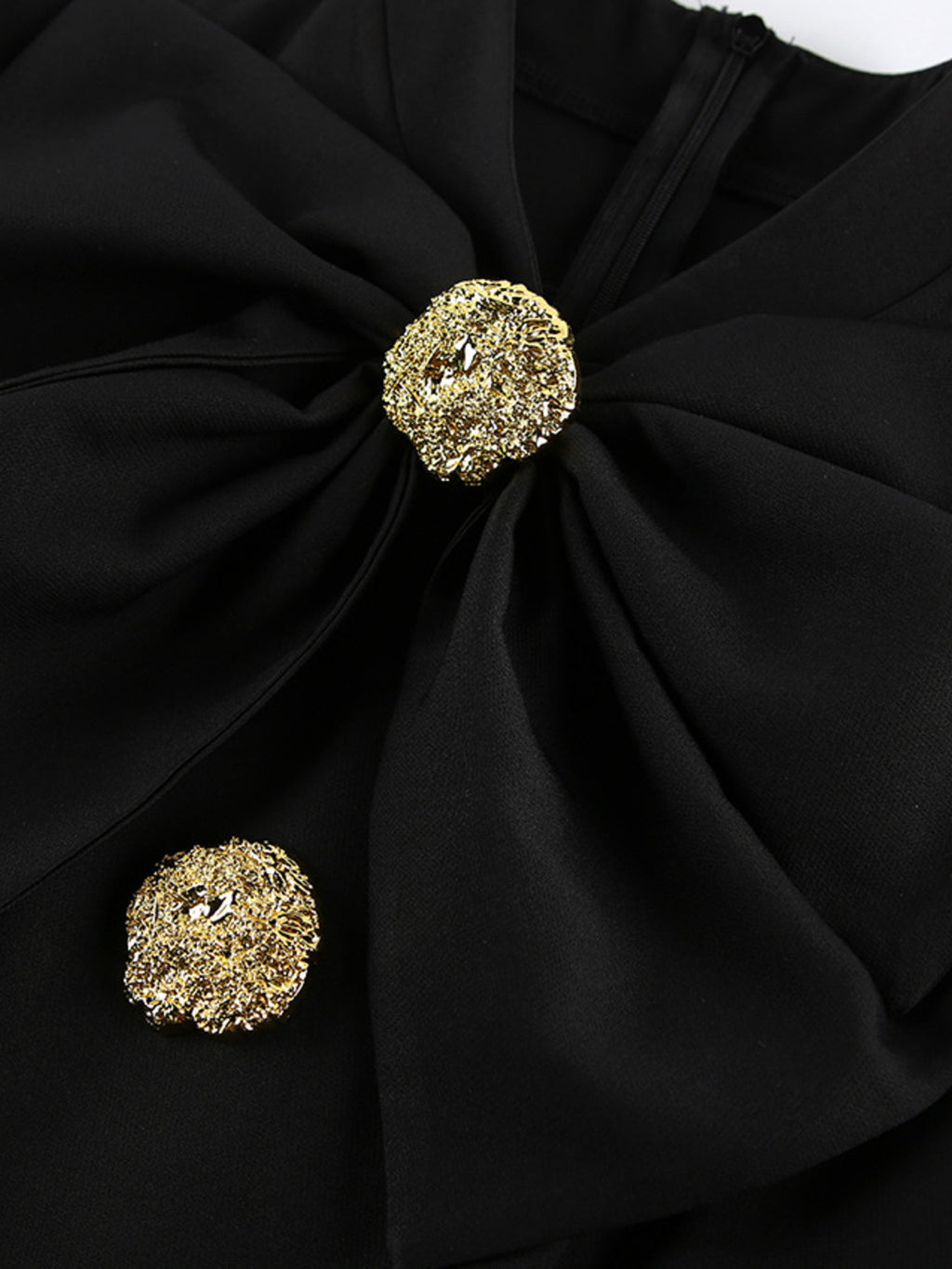 Black ruched midi dress with gold jeweled buttons and bow-like gathering