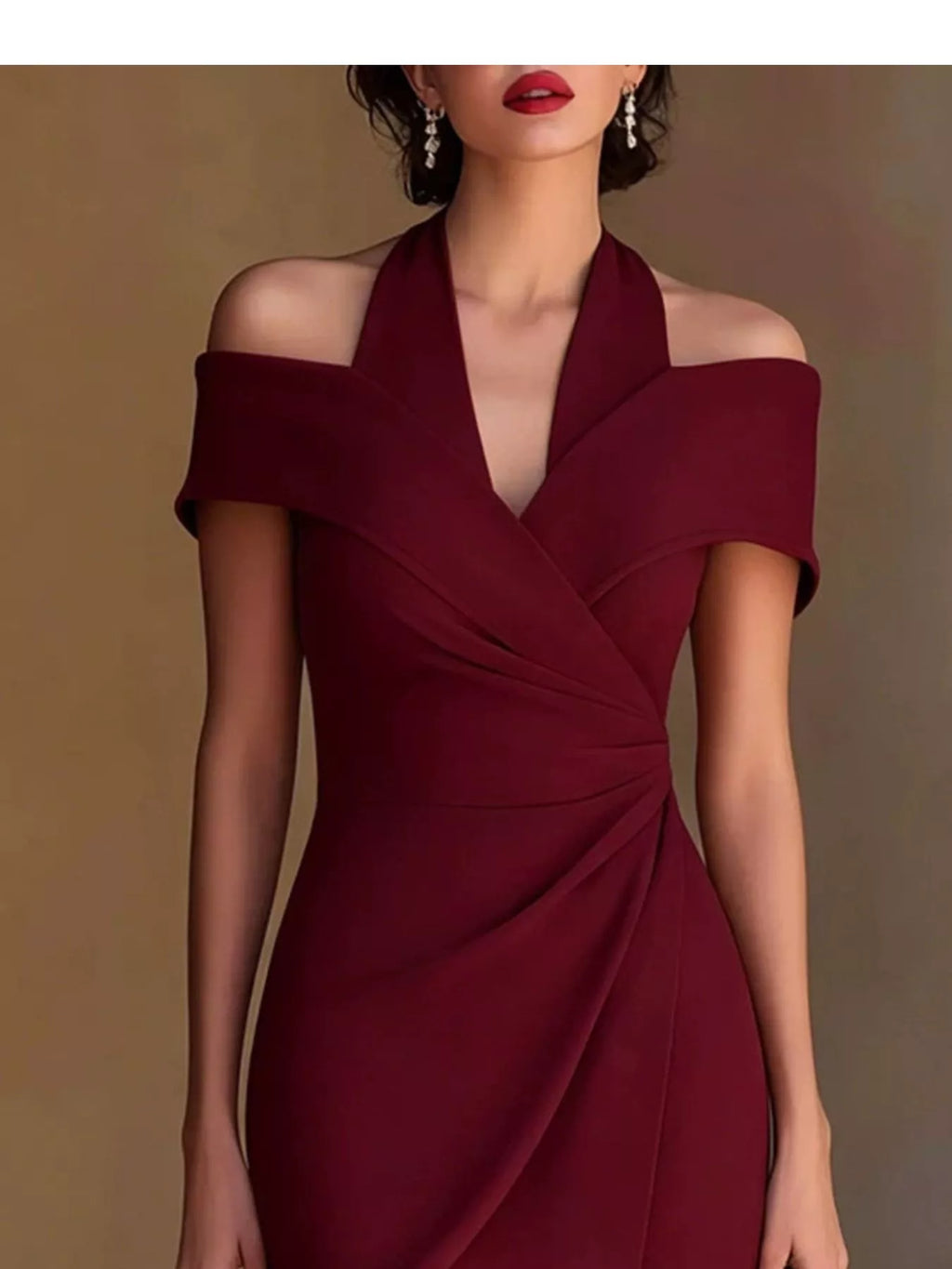 Burgundy cold-shoulder halter neck midi dress, V-neck front with wrap-style drape.