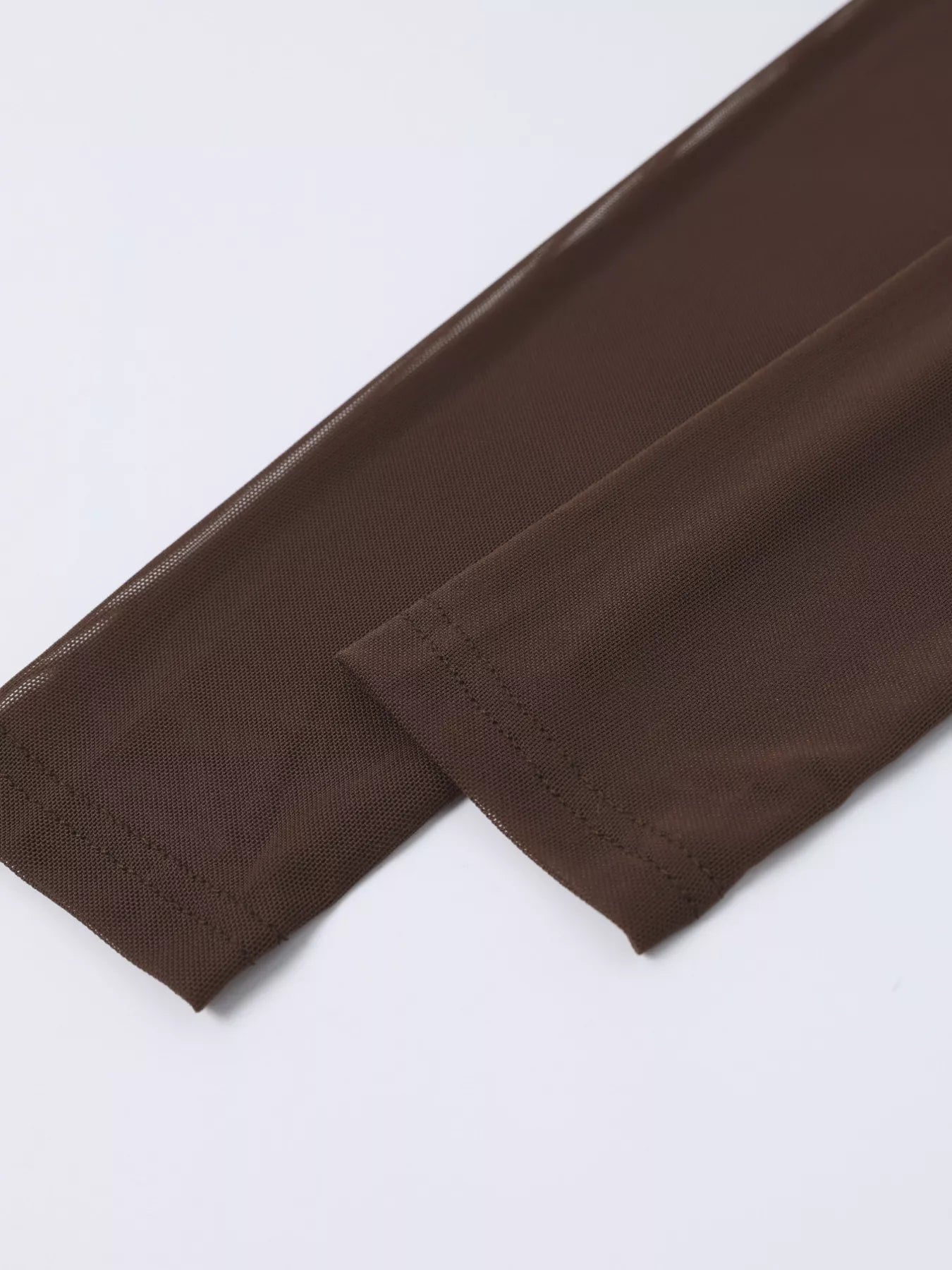 Brown maxi dress sleeve cuff and stitched seam detail